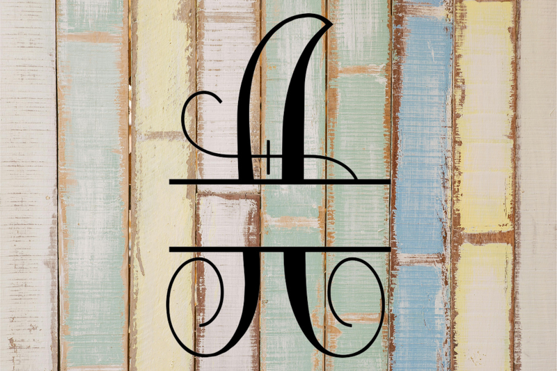 Decorative split letter monogram 'A' on a rustic wooden background with pastel colors.