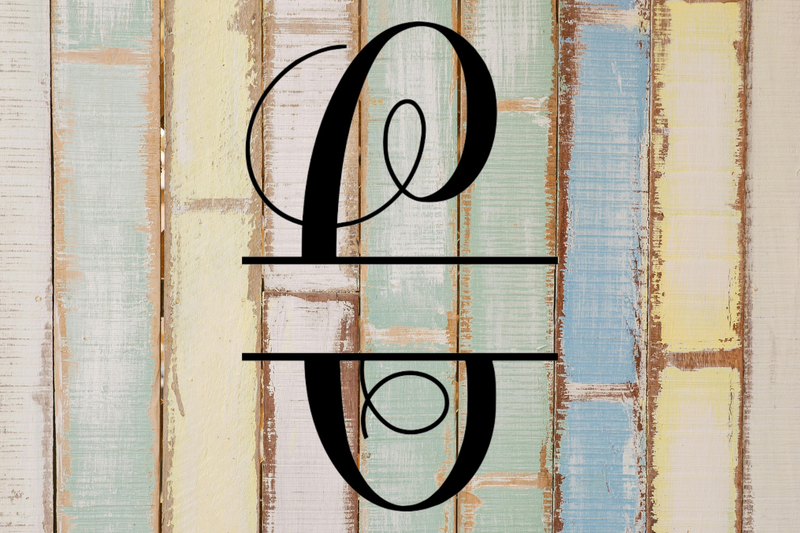 Decorative split letter monogram "C" on a wooden background with a rustic feel