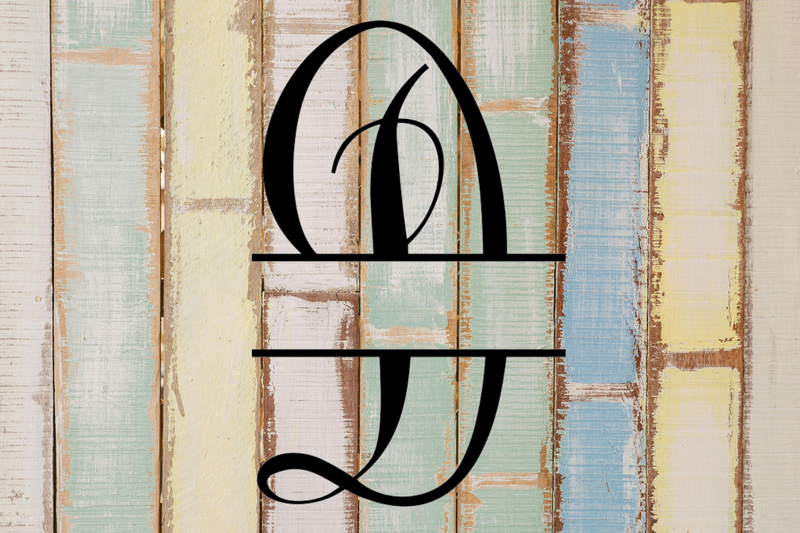 Decorative split letter monogram 'D' on a textured wooden background with pastel colors.