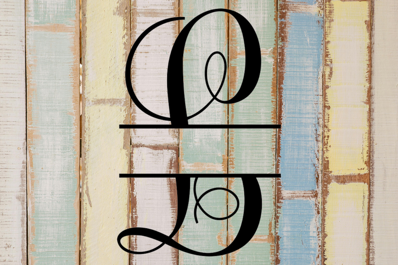 Split letter monogram 'L' on a wooden background with a rustic finish.