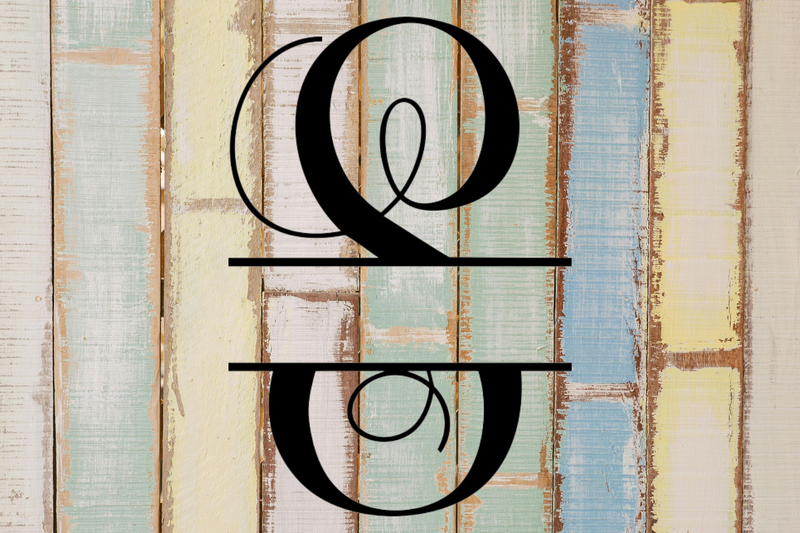Decorative split letter monogram 'S' on a wooden background with a rustic finish.