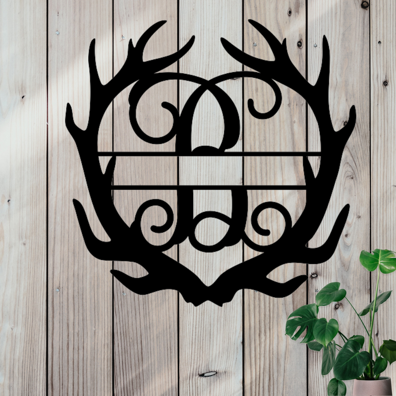 Metal sign in the shape of Antlers with a capital B and a space for a custom name.