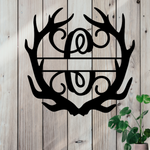 Metal sign in the shape of Antlers with a capital C and a space for a custom name.