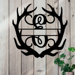 Metal sign in the shape of Antlers with a capital E and a space for a custom name.