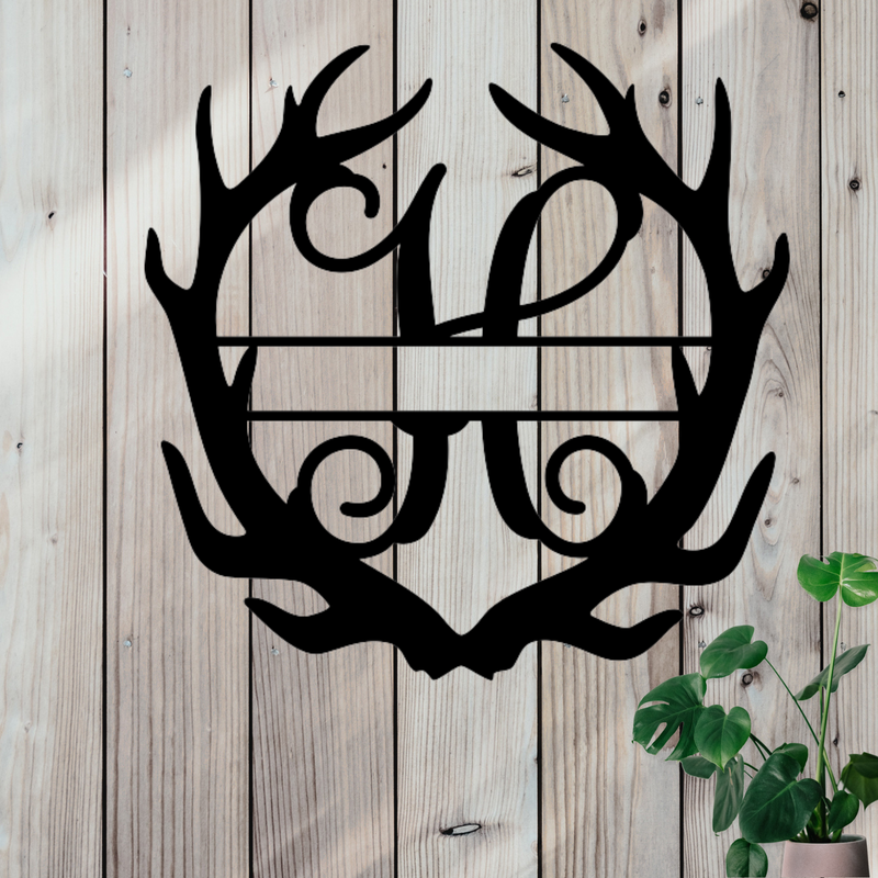 Metal sign in the shape of Antlers with a capital H and a space for a custom name.