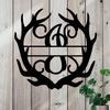Metal sign in the shape of Antlers with a capital J and a space for a custom name.