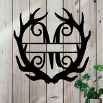 Metal sign in the shape of Antlers with a capital M and a space for a custom name.