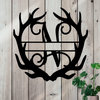 Metal sign in the shape of Antlers with a capital N and a space for a custom name.