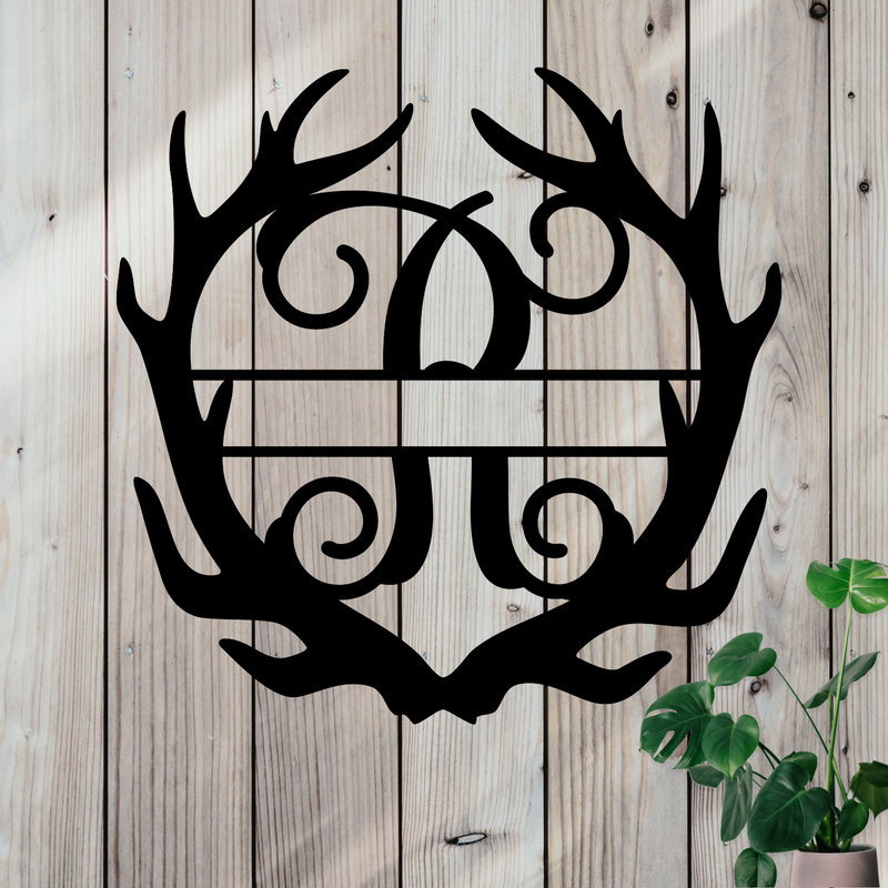 Metal sign in the shape of Antlers with a capital R and a space for a custom name.