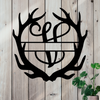 Metal sign in the shape of Antlers with a capital V and a space for a custom name.