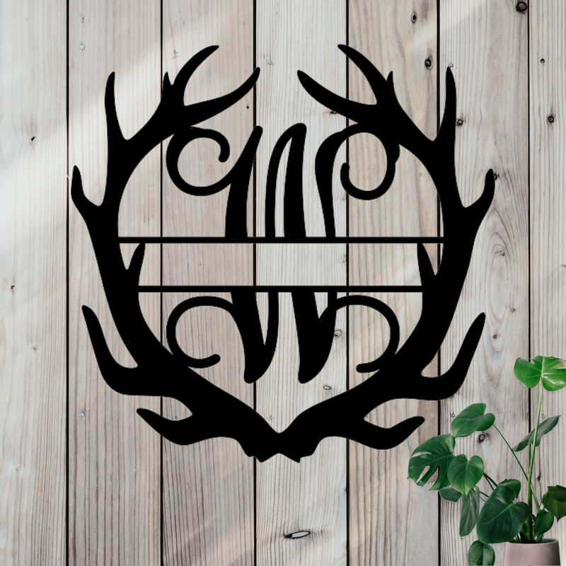 Metal sign in the shape of Antlers with a capital W and a space for a custom name.