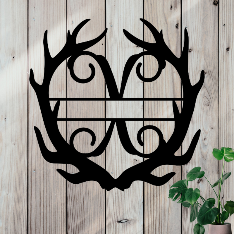 Metal sign in the shape of Antlers with a capital X and a space for a custom name.