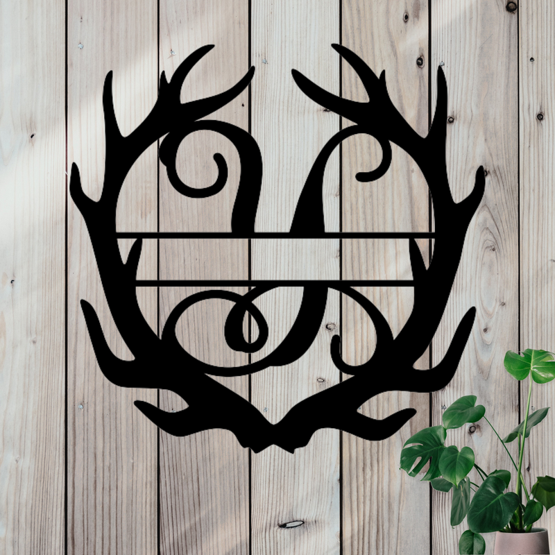 Metal sign in the shape of Antlers with a capital Y and a space for a custom name.