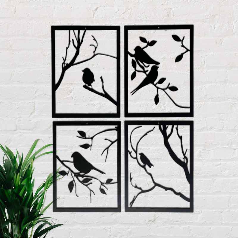 4 panels that make up a window with birds and branches in each panel. 