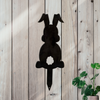 A silhouette of a cotton tailed bunny garden stake. 