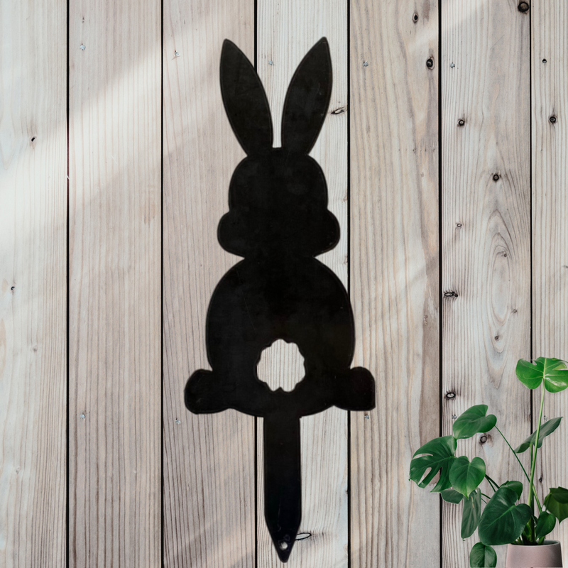 A silhouette of a cotton tailed bunny garden stake.